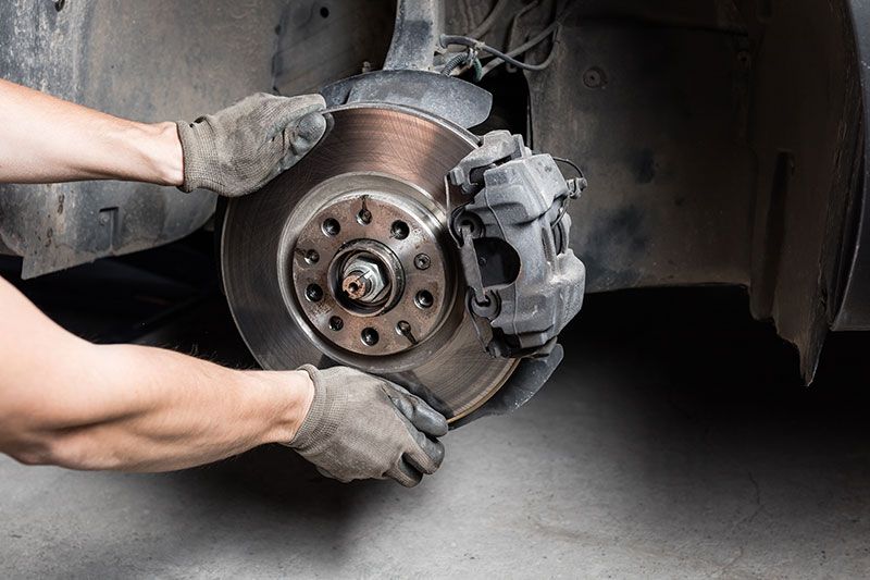 Changing brake in a car.